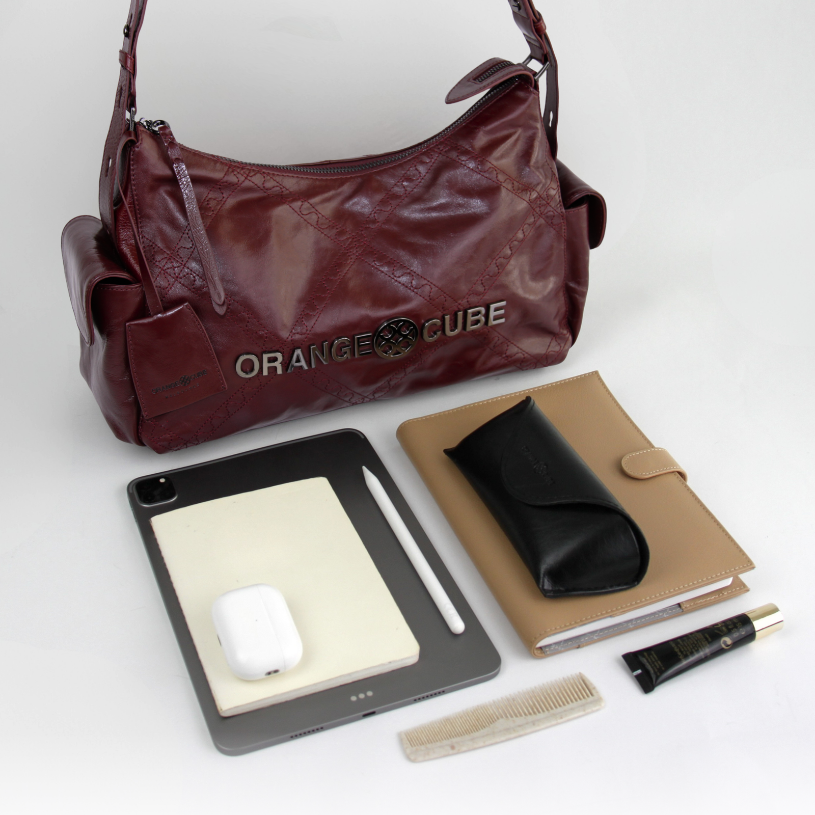What fits inside Metropolitan City Bag - Bordeaux Red