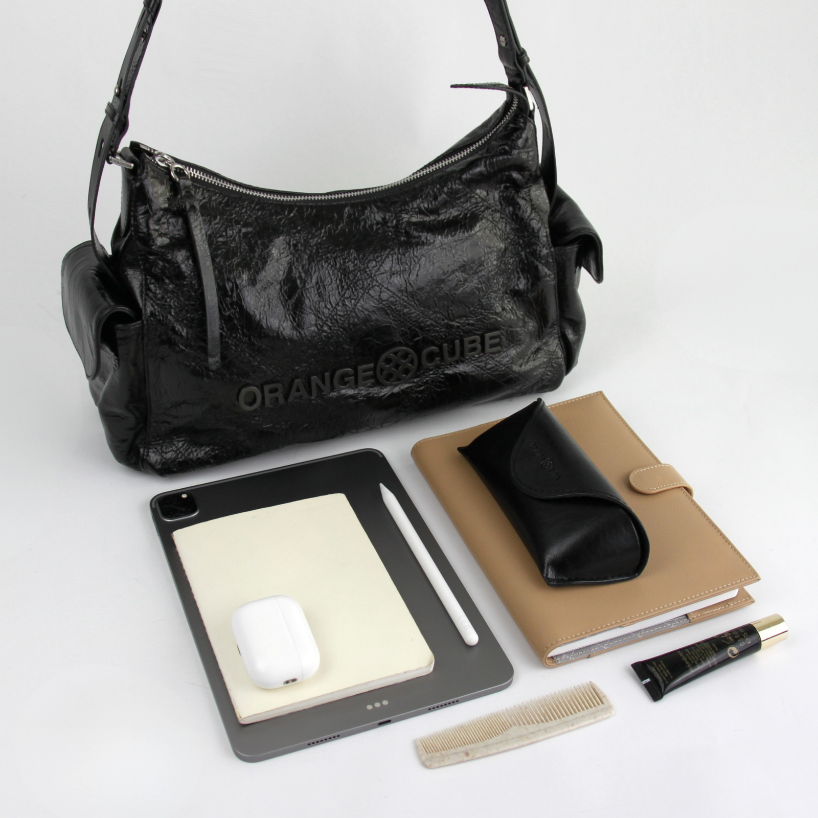 What fits inside Metropolitan City Bag - Black Gloss
