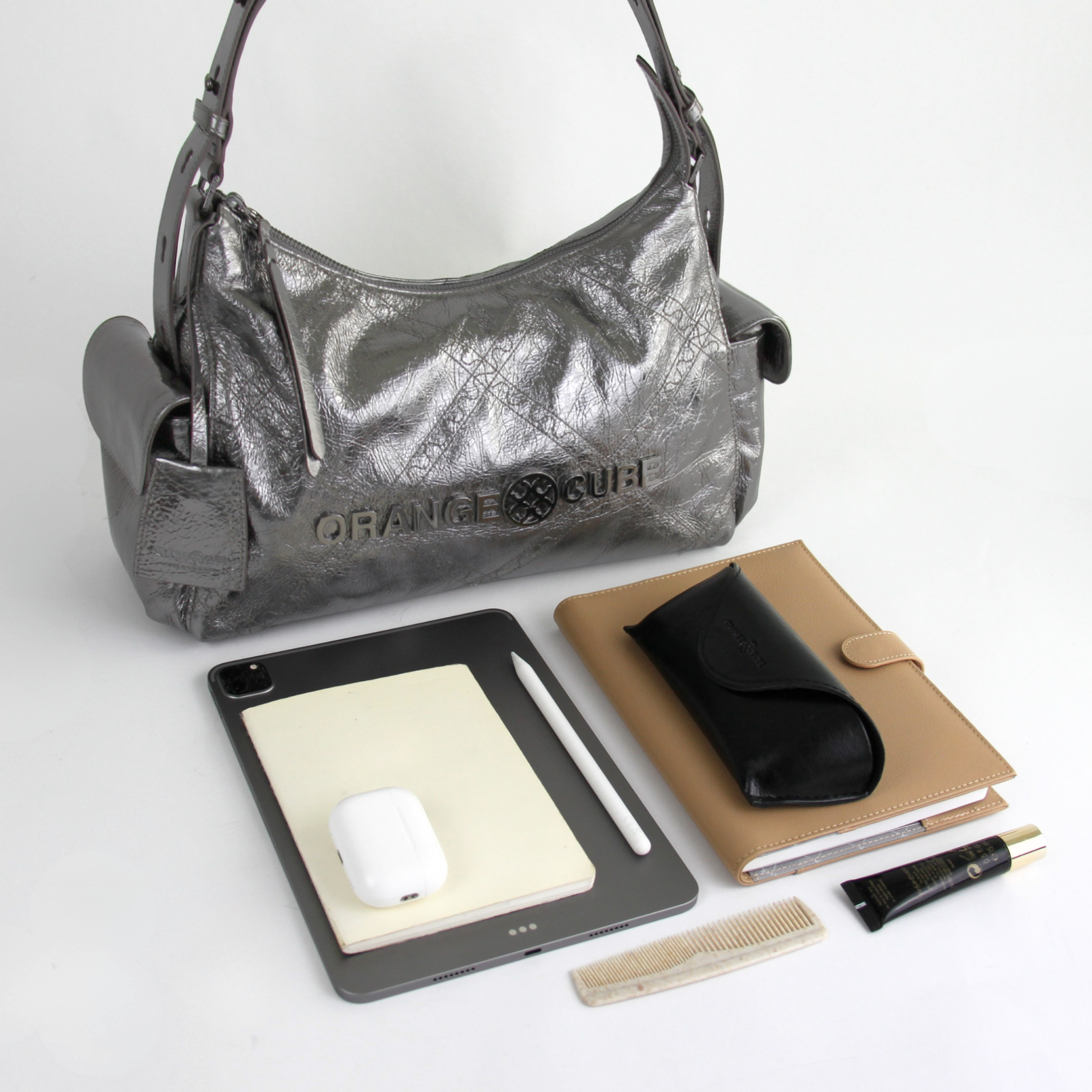What fits inside Metropolitan City Bag - Black Silver