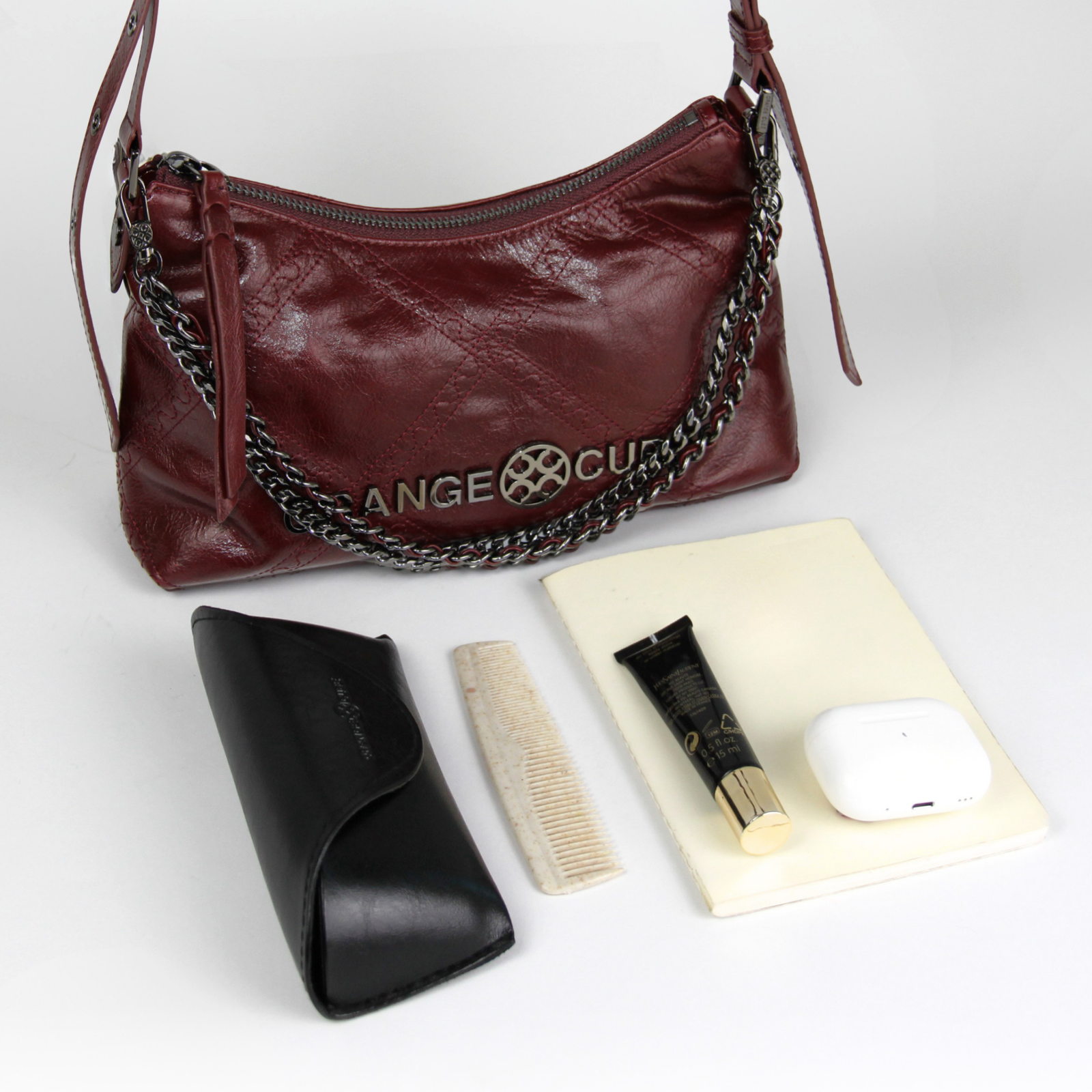 What fits inside Metropolitan Shoulder Bag - Bordeaux Red