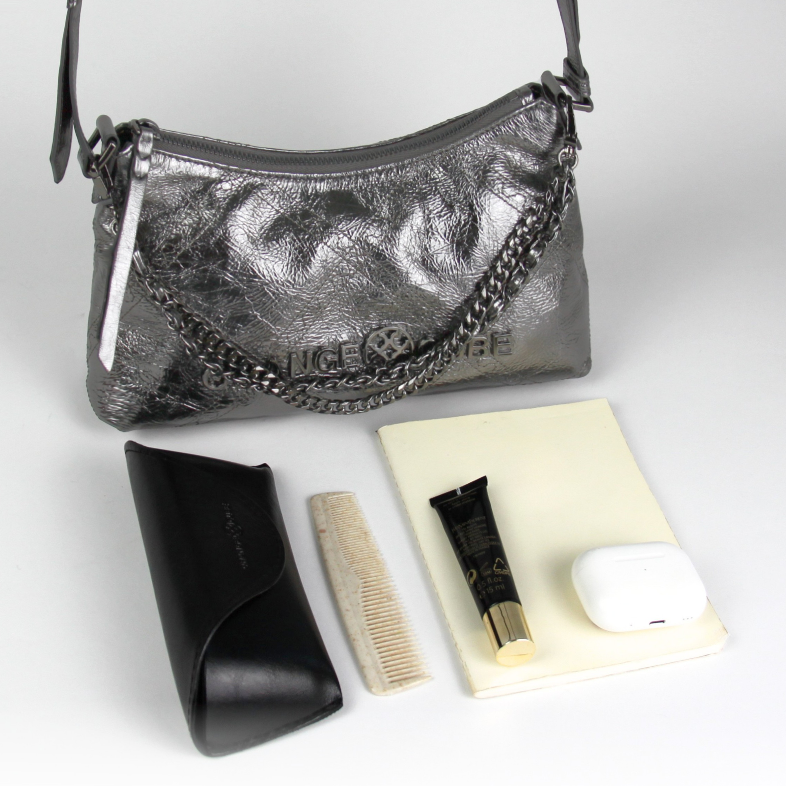 What fits inside Metropolitan Shoulder Bag - Black Silver