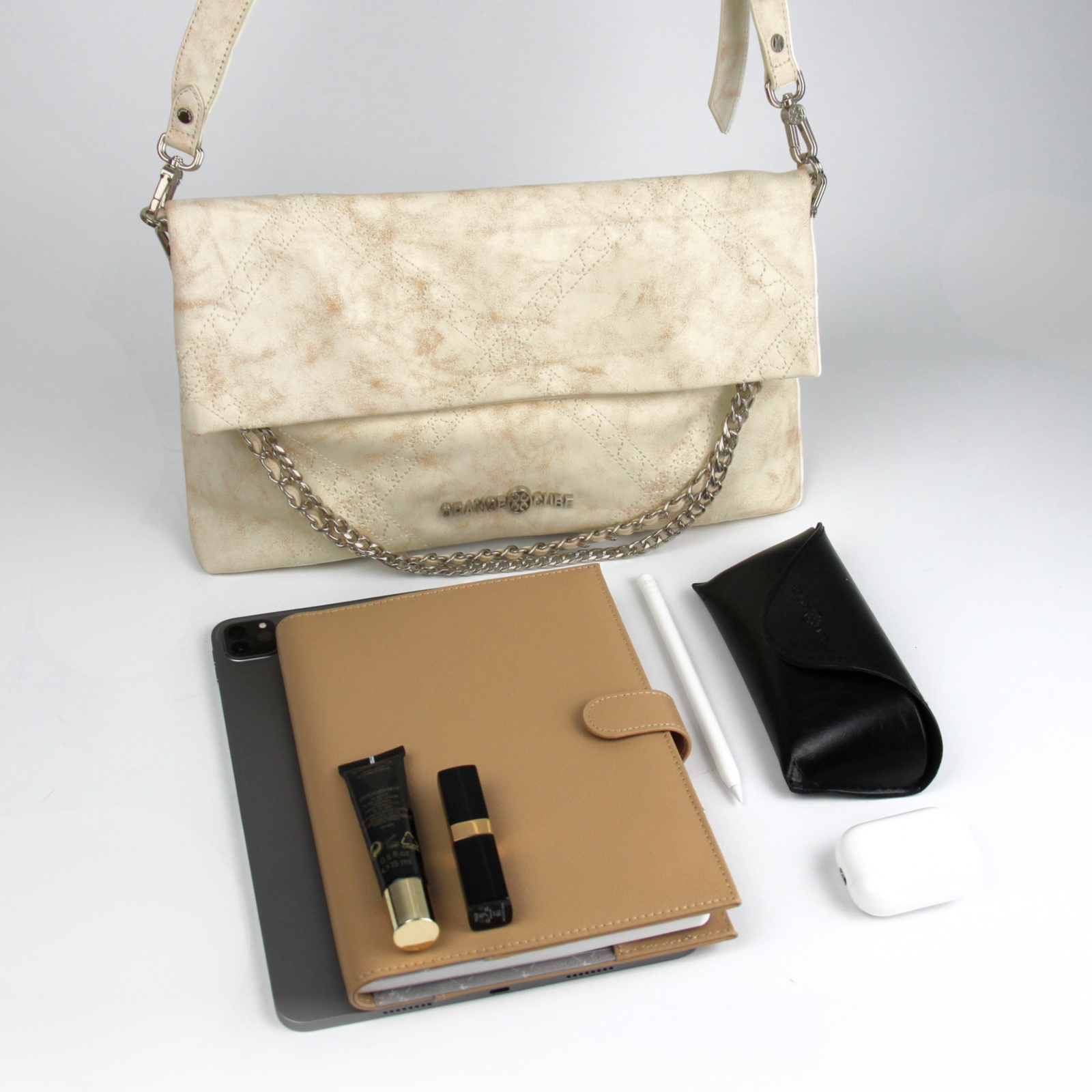 What fits inside Retro Messenger Bag - Marble White