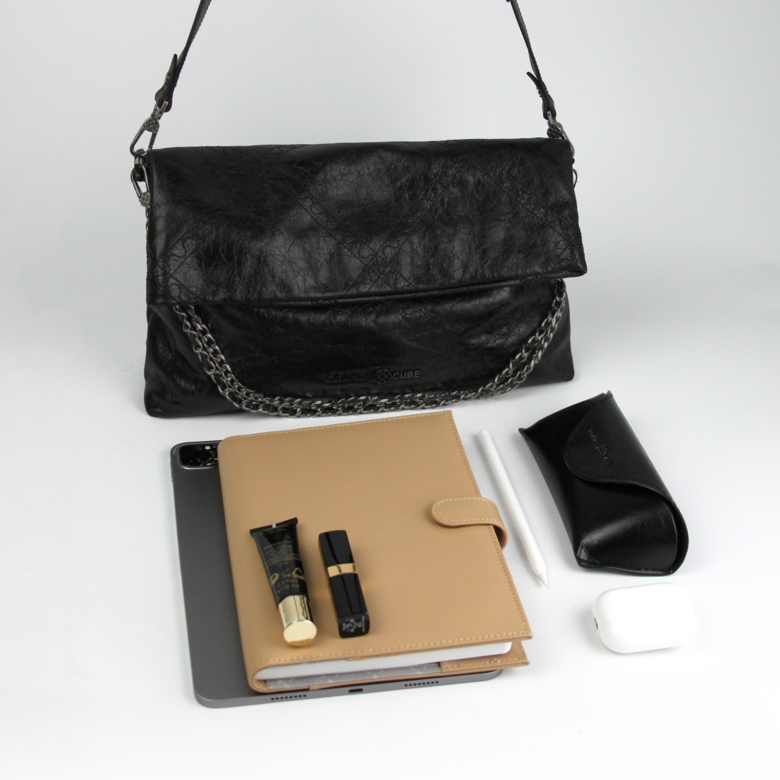 What fits inside Retro Messenger Bag - Black