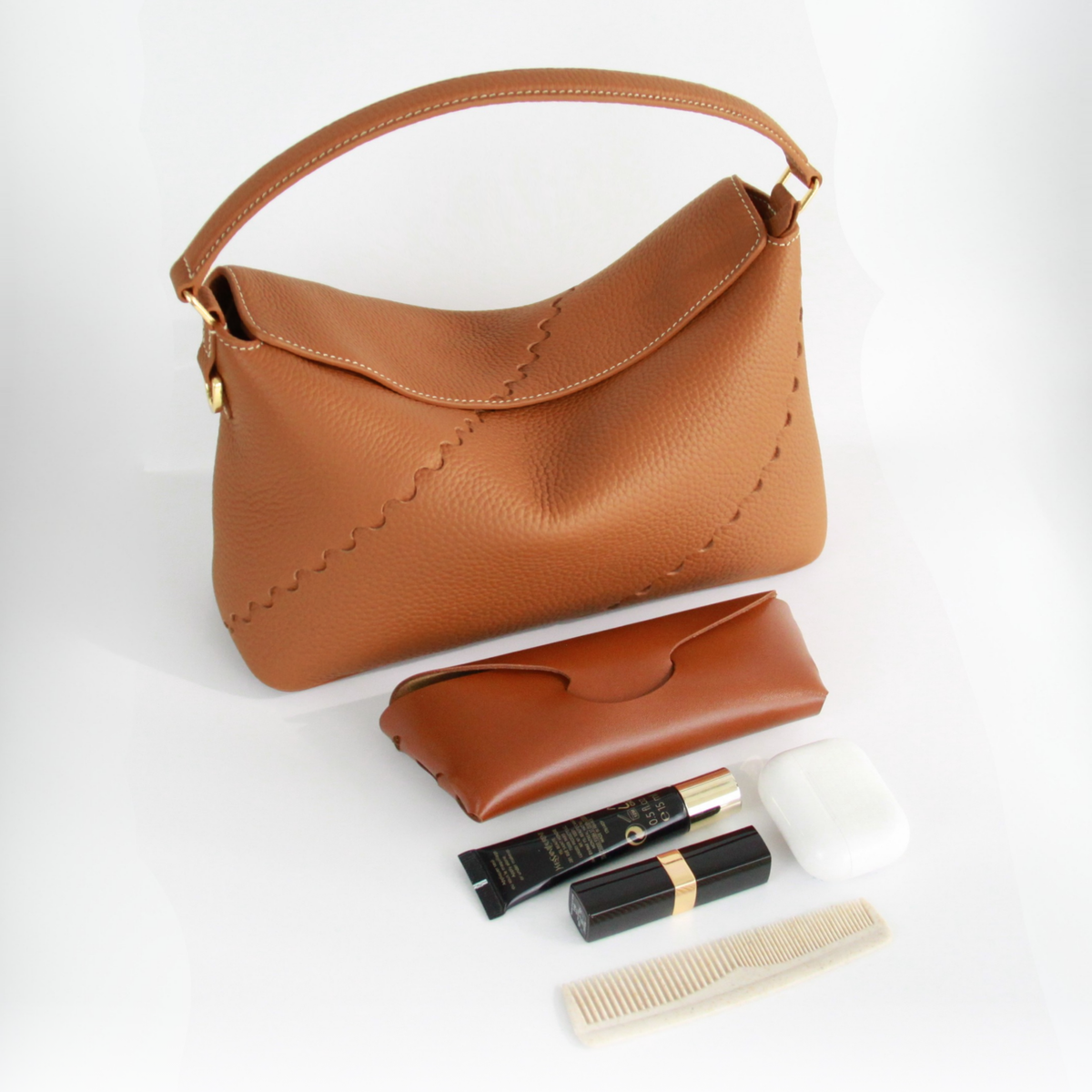 What fits inside Vina Shoulder Bag - Brown