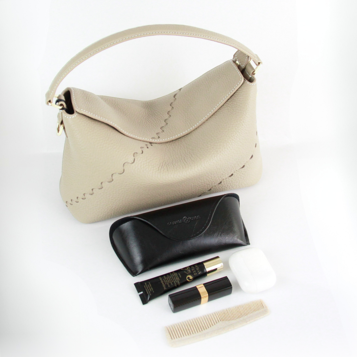 What fits inside Vina Shoulder Bag - Cream