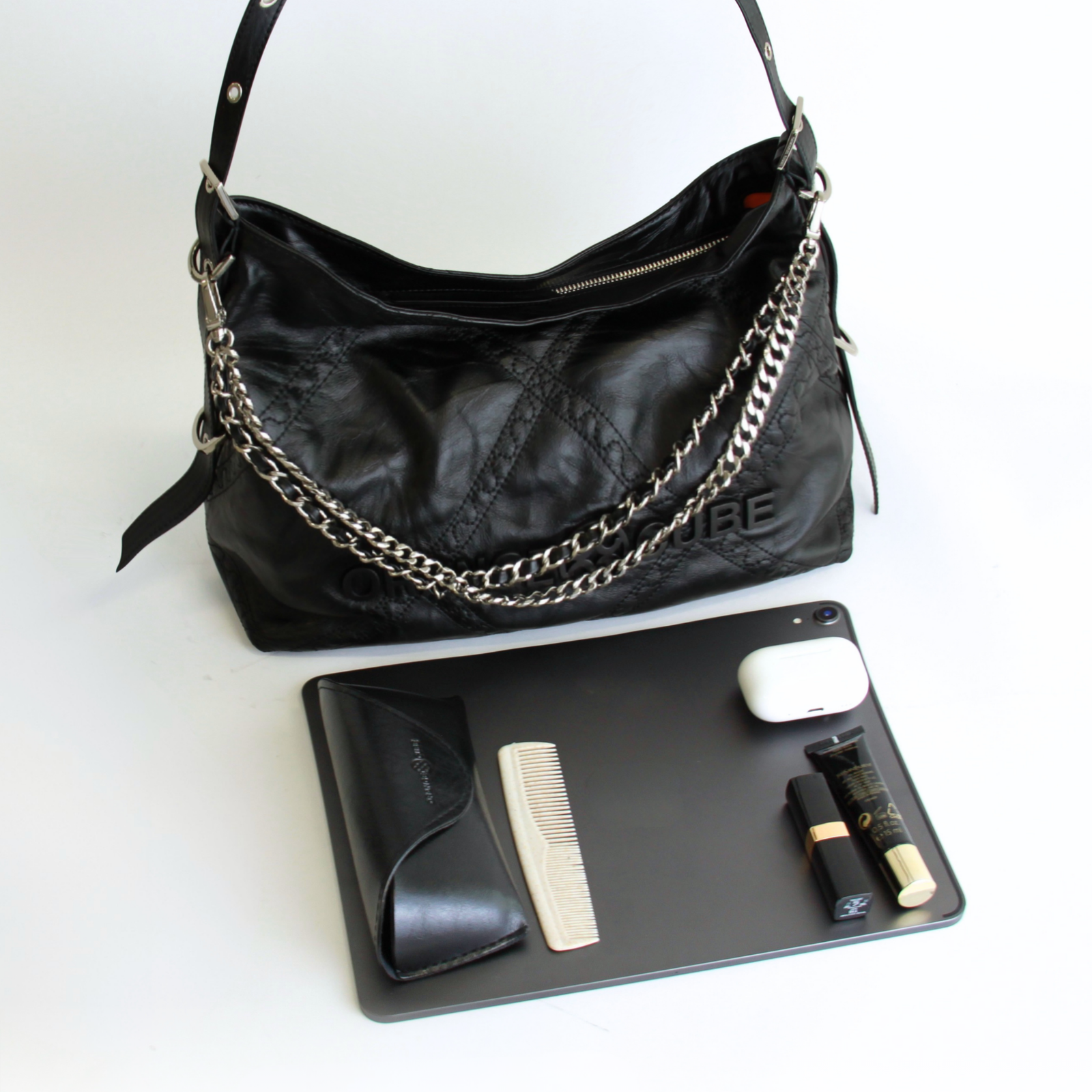 What fits inside Metropolitan Chain Hobo - Carbon Black