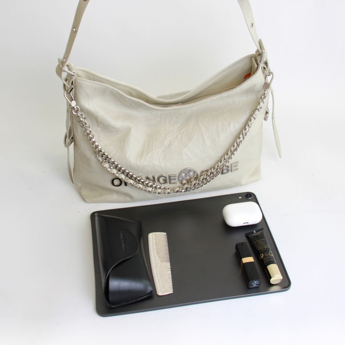 What fits inside Metropolitan Chain Hobo - Pearl