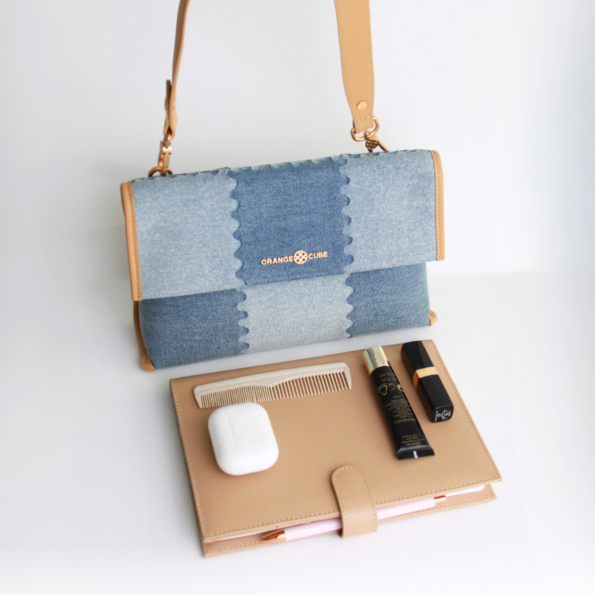 What fits inside Square Stitch Messenger Bag - Double Denim