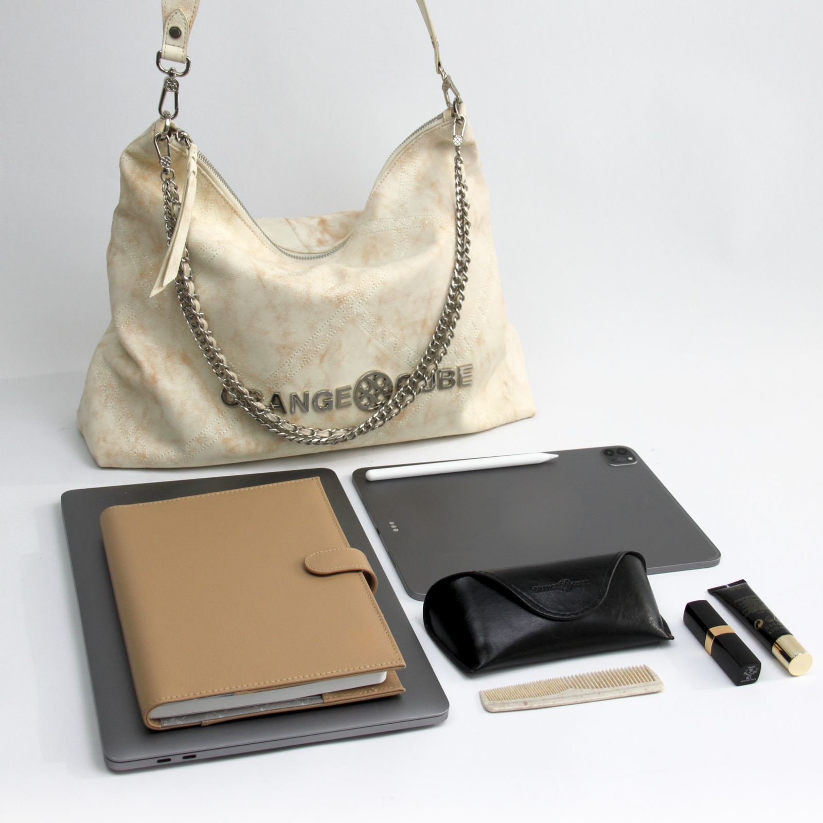 What fits inside Metropolitan Crossbody Bag - Marble White