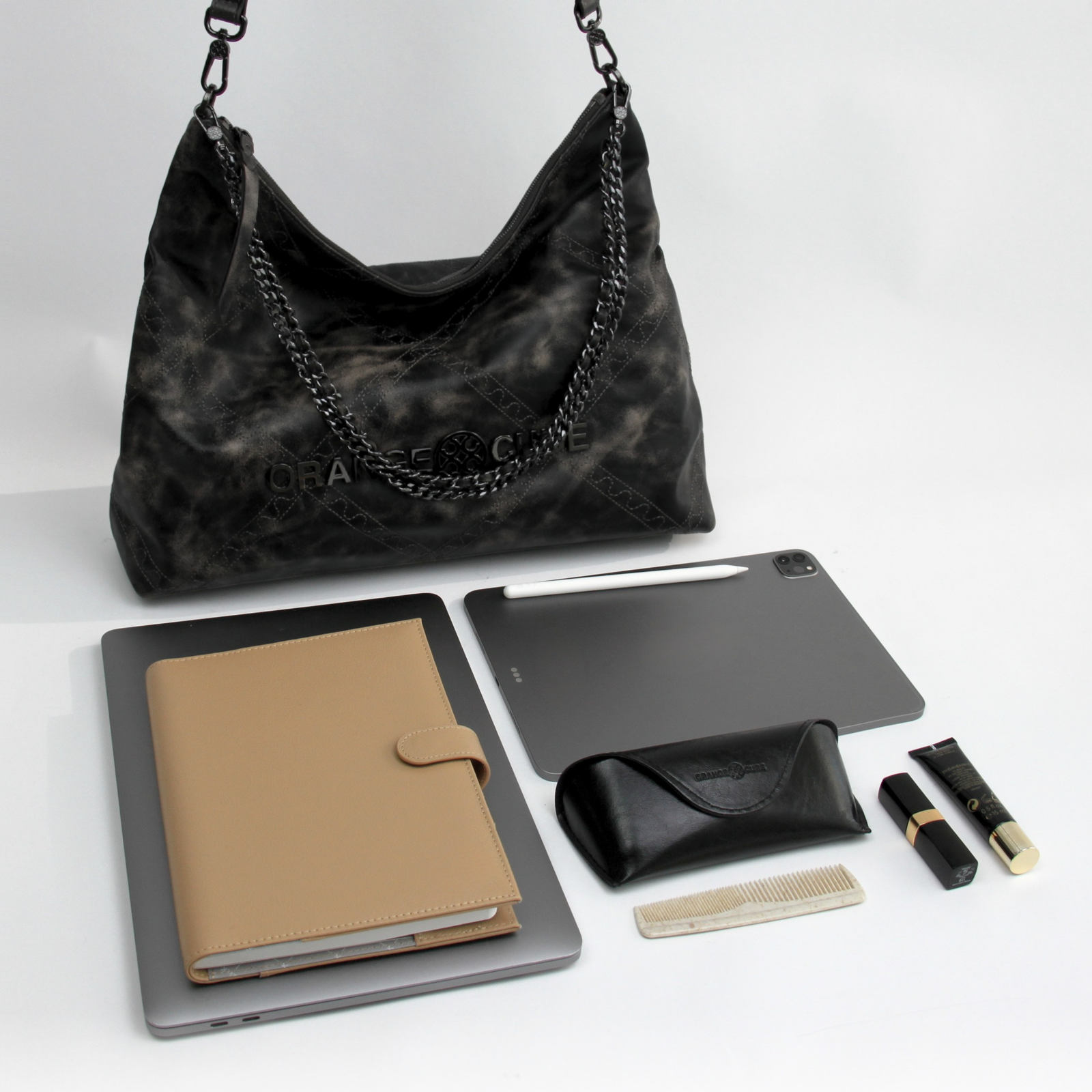What fits inside Metropolitan Crossbody Bag - Marble Grey