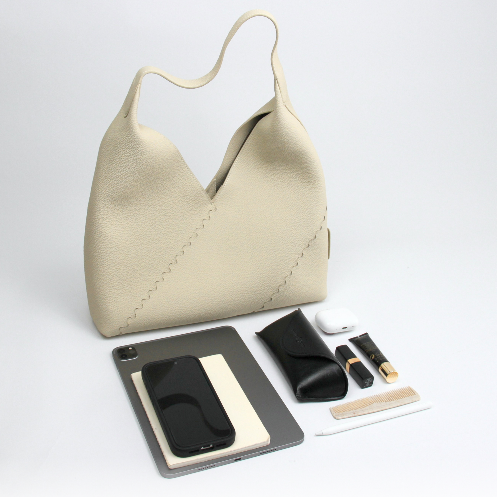 What fits inside Mosaic Triangle Tote - White