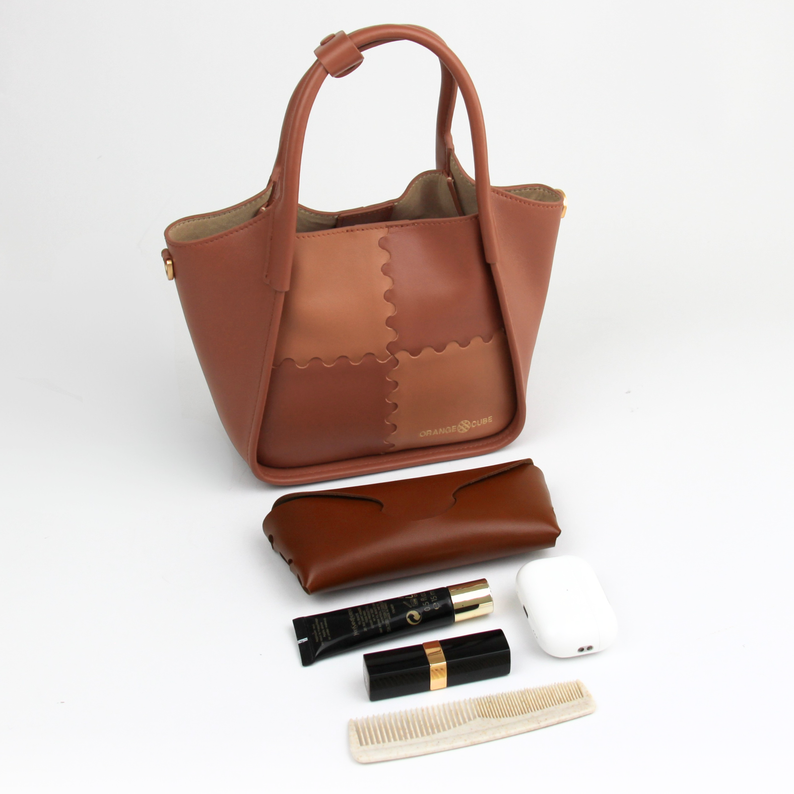 What fits inside Square Stitch Basket Bag - Brown