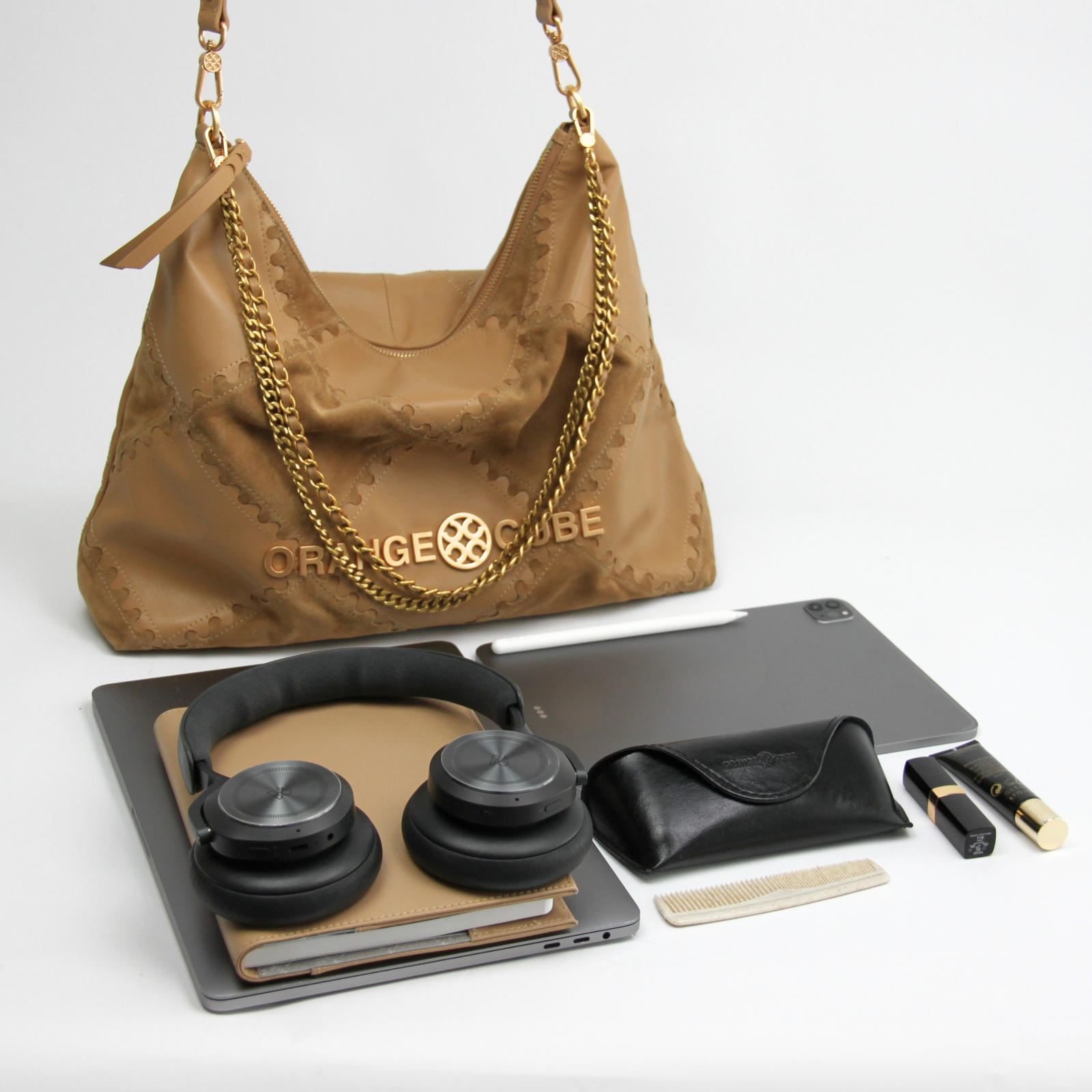 What fits inside Metropolitan Crossbody Bag - Honey Brown