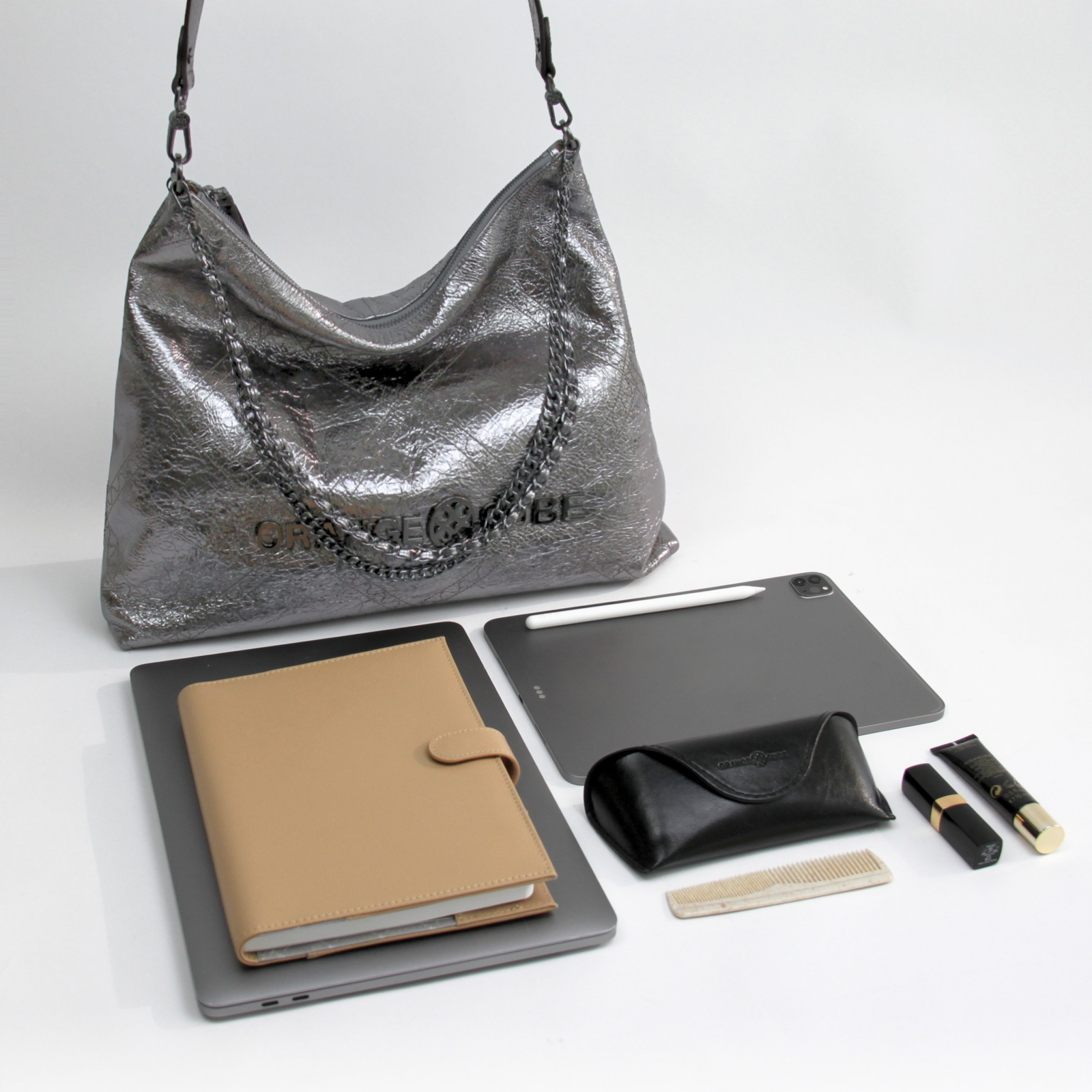 What fits inside Metropolitan Crossbody Bag - Black Silver
