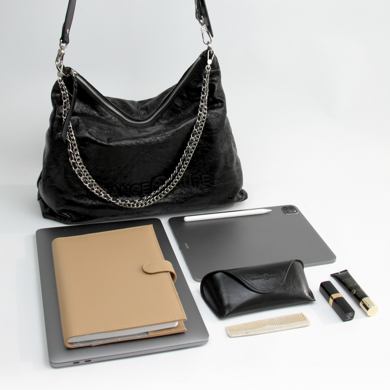 What fits inside Metropolitan Crossbody Bag - Black