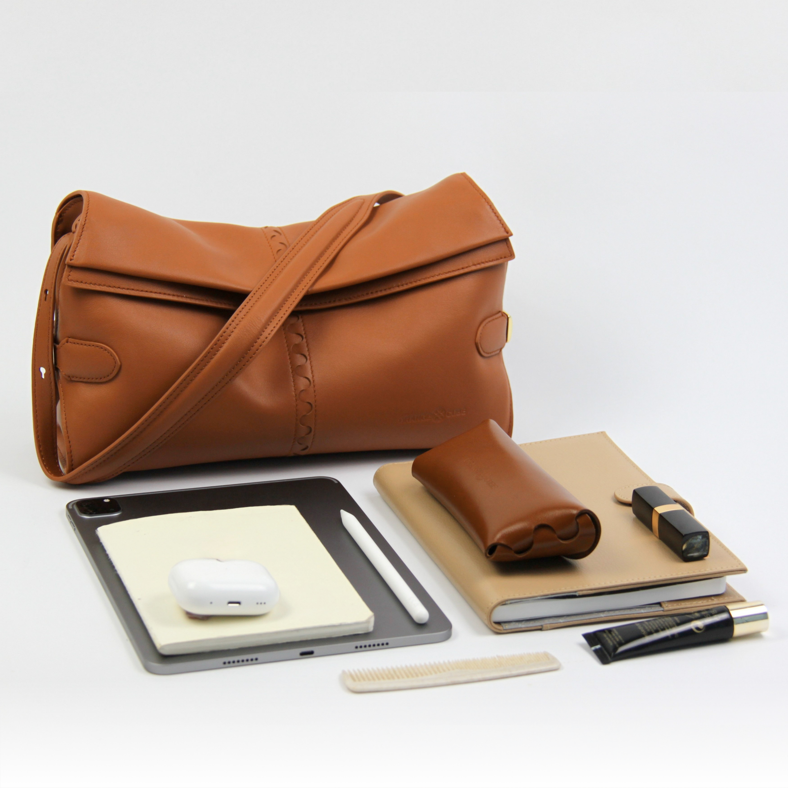 What fits inside Fantina Folded Hobo Bag - Brown
